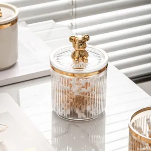 Elegant clear vertical stripe storage jar with gold bear lid for swabs and cotton pads