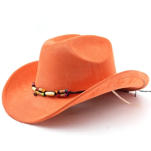 Close-up of bright orange suede cowboy hat with colorful ethnic bead decoration