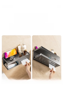 Wall-mounted dark grey tissue box with dual dispensing outlets and top storage shelf