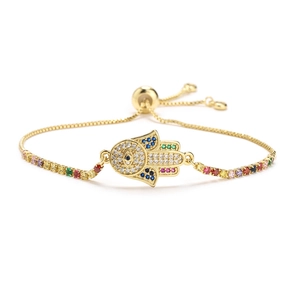 Detailed close-up of Hamsa hand bracelet with colorful cubic zirconia and sliding clasp