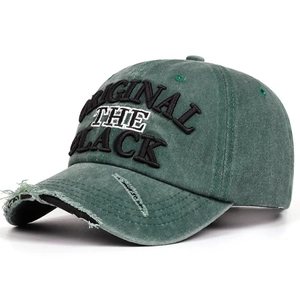 Detail showing the distressed brim and 3D embroidery on this vintage washed cotton cap