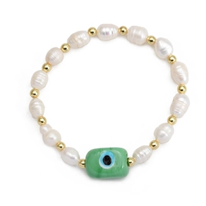 Detail of freshwater pearl bracelet with golden beads and a green evil eye rectangular charm