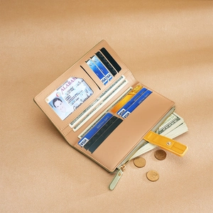 Women's long faux leather wallet in khaki featuring multiple card slots and zipper pocket