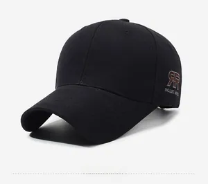 Close-up of the detailed three-dimensional RR embroidery on the side of a black cotton cap