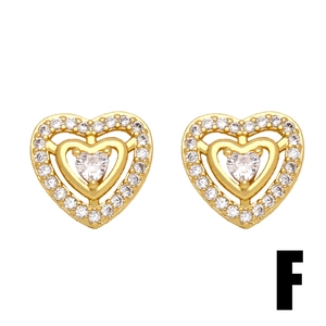 Sparkling gold-tone nested heart stud earrings with cubic zirconia pavé setting