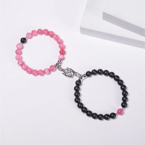 Natural stone magnetic couple bracelets with pink and black beads and handshaking charms