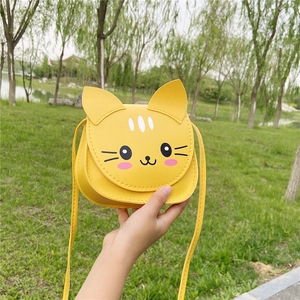Cute yellow cat-shaped children's crossbody bag with ears and face print