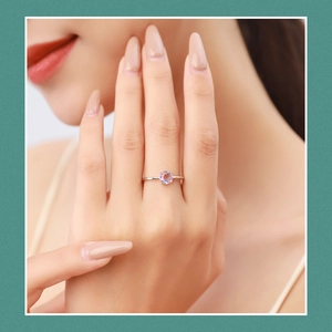 S925 sterling silver ring with round watermelon tourmaline gem worn by a model