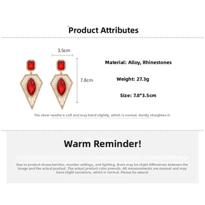 Detail view of red rhinestone drop earrings with dimensions and material specifications