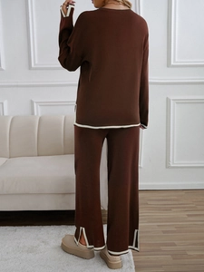 Rear view of brown knitted two-piece set with long sleeve top and white piping detail