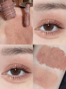 Macro detail of pink liquid eyeshadow showing glitter texture on skin and eye