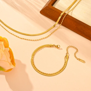 Golden stainless steel double-layer necklace and bracelet set with snake and bead chains