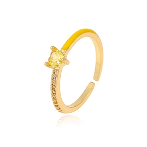 Close-up of golden adjustable ring featuring a yellow heart zircon and side accents