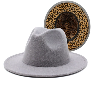 Detailed view of gray fedora hat featuring a striking leopard print lining and wide brim