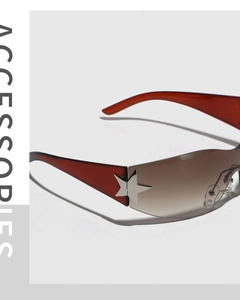 Detail of Y2K rimless sunglasses featuring star metal decor and gradient lenses