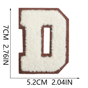 Macro detail of 7cm chenille letter D patch with cream embroidery and brown felt base
