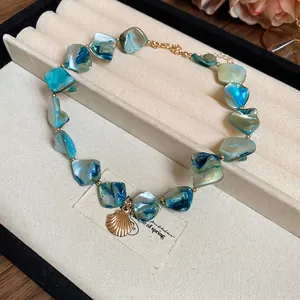 Irregular blue shell pearl necklace with golden seashell pendant for beach vacation