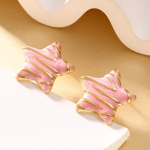 Chic pink enamel star stud earrings with gold plating on a textured stone base