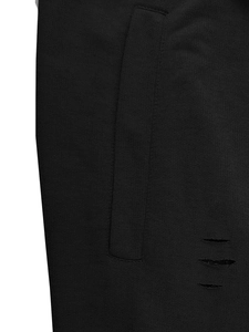 Detailed macro shot of men's black casual shorts featuring side pockets and distressed details