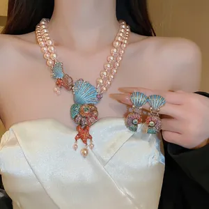 Double-layer pearl necklace and earrings set with shell and starfish charms