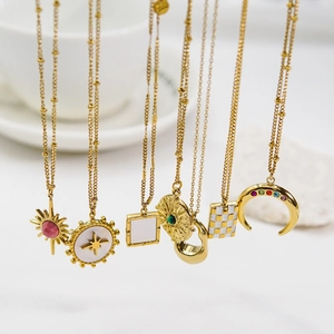 Collection of luxury 14k gold plated stainless steel necklaces with natural stones and charms