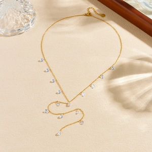 Minimalist long gold-plated stainless steel necklace with blue crystal water droplets