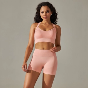 Close-up of seamless high-waist fitness shorts and matching ribbed sports bra texture