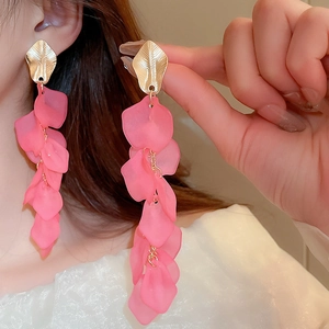 Elegant acrylic petal tassel earrings with gold leaf top for a chic vacation look