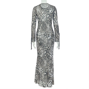 Detail of leopard print maxi dress showing round neck and lace-up drawstring sleeve cuffs