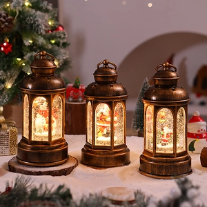 Vintage bronze Christmas lantern with LED glowing Santa scenes and swirling snow effects