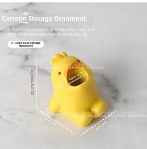 Detail view of yellow cartoon duck resin holder for nail drill bits and small items