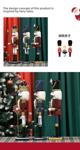 Close-up of wooden Christmas nutcracker soldiers in royal uniforms with festive decor