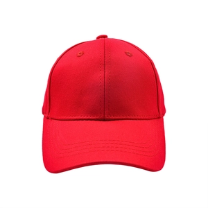 Close-up of a vibrant red cotton baseball cap with reinforced stitching and eyelets