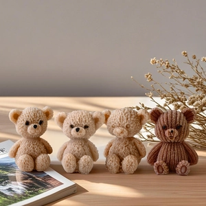 Detail of cute bear aromatherapy candles featuring realistic knitted yarn textures