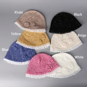 Handmade crochet bucket hats with floral details and lace trim in seven assorted colors
