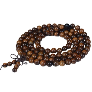 Deep brown Dalbergia 108 wood prayer beads bracelet with tassel on white background