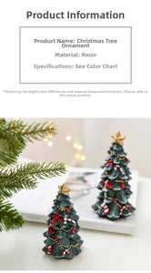 Close-up of a mini resin Christmas tree with red bows and candy canes in warm light