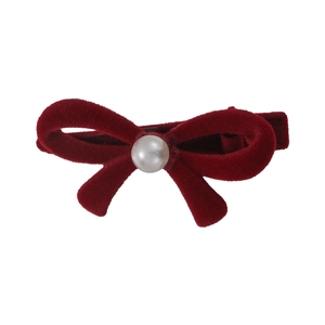Elegant wine red velvet bow hair clip with a centered white pearl decoration