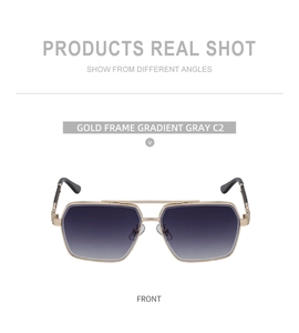 Front view of gold metal sunglasses with gradient gray lenses and high-end retro design