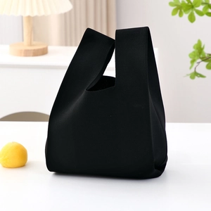 Minimalist black knit knot handbag for women, high-density woven aesthetic tote bag