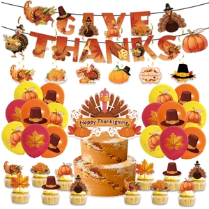 Detailed set of Thanksgiving party decorations with Give Thanks banner and turkey toppers