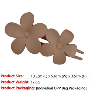 Matte pink double flower hair clip with dimensions 10.3cm x 5.6cm and lightweight design
