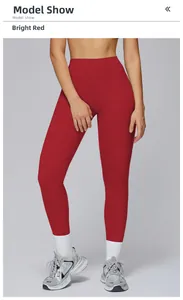 Detail of high-waisted bright red yoga pants featuring breathable brushed texture fabric