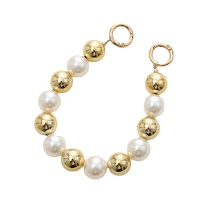 Chic phone strap with alternating gold beads and white pearls on white background