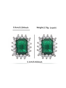 Detail view of emerald green square earrings showing dimensions 0.9cm width by 1.1cm height