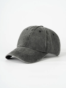 Detail view of vintage washed cotton baseball cap with curved brim and 6-panel crown