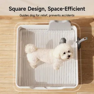 Extra large stainless steel dog toilet with high splash guard and mesh grate on wood floor
