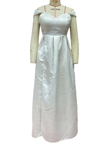 Close-up of white satin dress detailing pleated high waist and smooth A-line silhouette