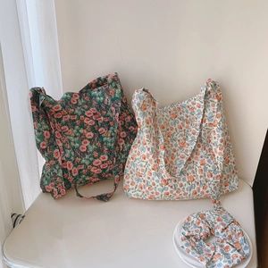 Quilted floral cotton tote bags with nature-inspired patterns and matching scrunchie