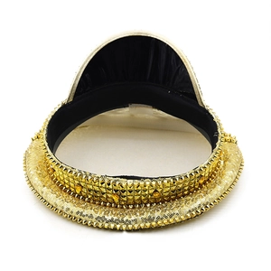 Detail of gold sequined bride party hat featuring sharp metallic studs and inner lining
